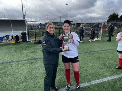 PSNI captain receiving the Cup from ACC Jones ~ Feb 2025