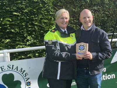 DCU Football League President receiving plaque from Assistant Commisioner Paula Hillman - Sept 2025
