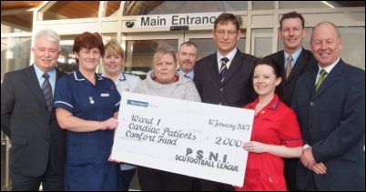presenting a cheque to Sister Denise Kelly and other staff of behalf of Ward 1's Patients Comfort Fund